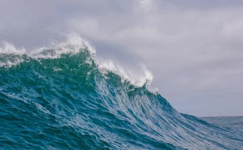 Big waves breaking on an reef along the coast of South Africa Stock Photos