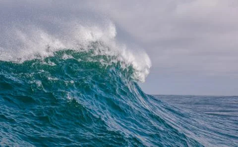 Big waves breaking on an reef along the coast of South Africa Stock Photos