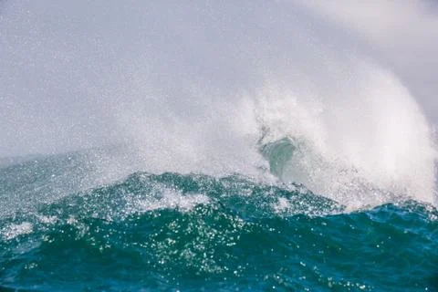 Big waves breaking on an reef along the coast of South Africa Stock Photos