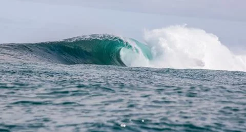 Big waves breaking on an reef along the coast of South Africa Stock Photos