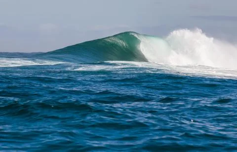 Big waves breaking on an reef along the coast of South Africa Stock Photos