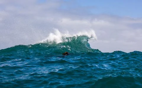 Big waves breaking on an reef along the coast of South Africa Stock Photos