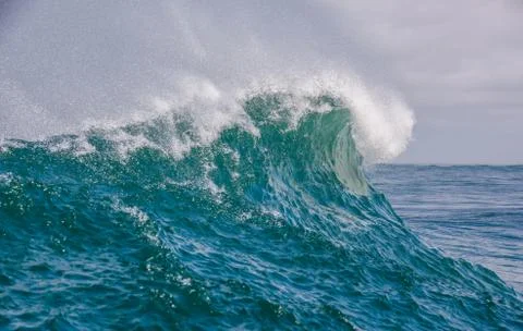 Big waves breaking on an reef along the coast of South Africa Stock Photos