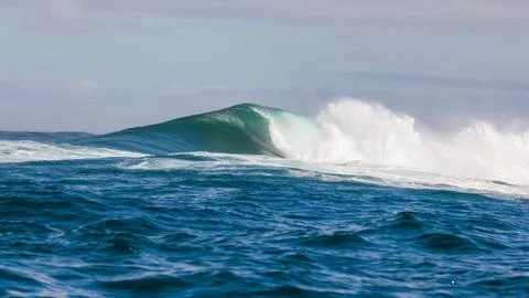 Big waves breaking on an reef along the coast of South Africa Stock Photos