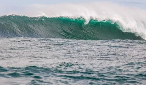 Big waves breaking on an reef along the coast of South Africa Stock Photos