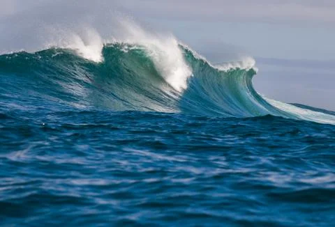 Big waves breaking on an reef along the coast of South Africa Stock Photos