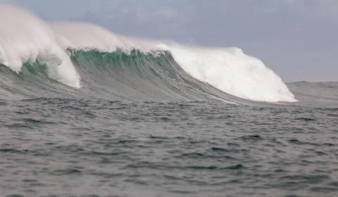Big waves breaking on an reef along the coast of South Africa Stock Photos