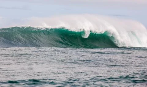 Big waves breaking on an reef along the coast of South Africa Stock Photos