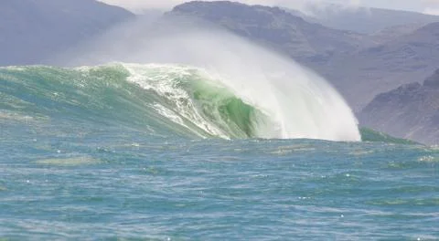 Big waves breaking on an reef along the coast of South Africa Stock Photos