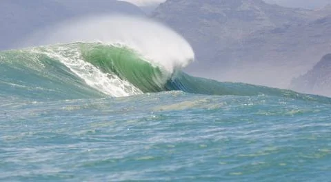 Big waves breaking on an reef along the coast of South Africa Stock Photos