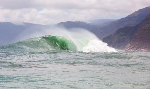 Big waves breaking on an reef along the coast of South Africa Stock Photos