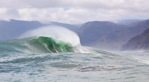 Big waves breaking on an reef along the coast of South Africa Stock Photos