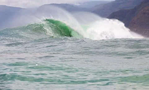 Big waves breaking on an reef along the coast of South Africa Stock Photos