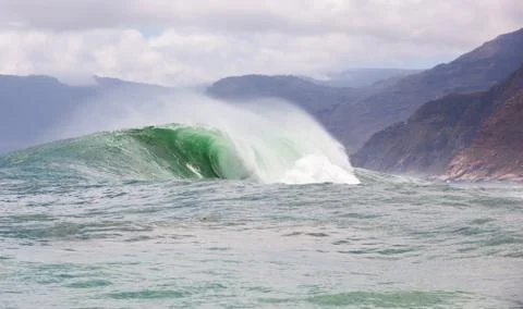 Big waves breaking on an reef along the coast of South Africa Stock Photos