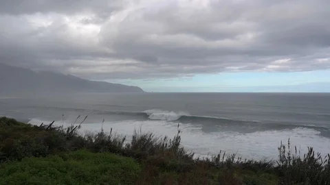 Big waves breaking on the rough island Stock Footage 128304966