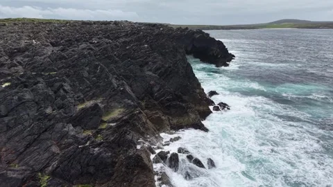 Big waves crash against the cliffs near Ballyglass, West Ireland. Stock Footage 342733484