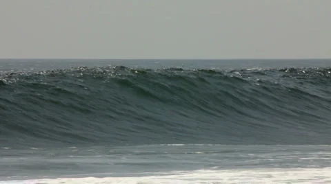 BIG WAVES CRASH AT THE BEACH Stock Footage 5655476