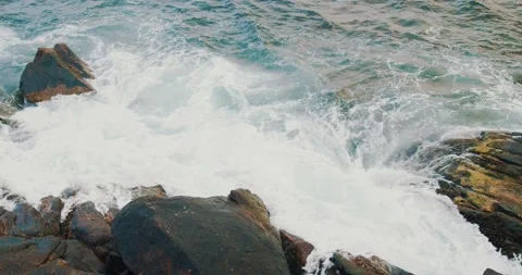 Big Waves Crash Into Black Rocks on the Rocky Coast of Canada Stock Footage 240015411