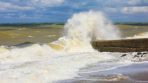 Big waves crash on the pier. Storm on the west coast of Crimea. Stock Footage 114273443