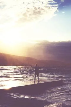 Big waves crushing on stone pier, on stormy weather. Stock Photos