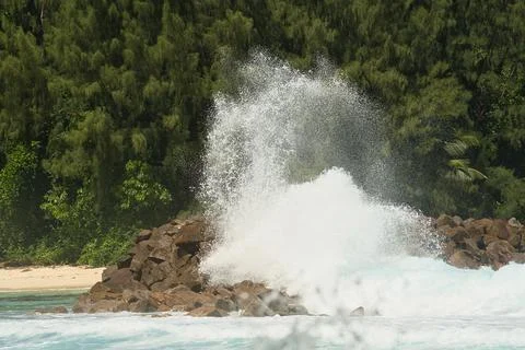 Big waves crusing on huge granite stones on Mahe island, Seychelles 1 Stock Photos