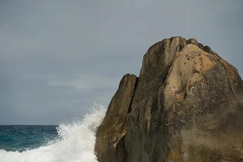 Big waves crusing on huge granite stones on Mahe island, Seychelles Stock Photos