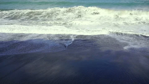 Big waves on an empty beach Stock Footage 135843570