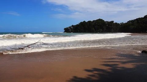 Big waves with foam in the Caribbean coast of Costa Rica Stock Footage 123549523