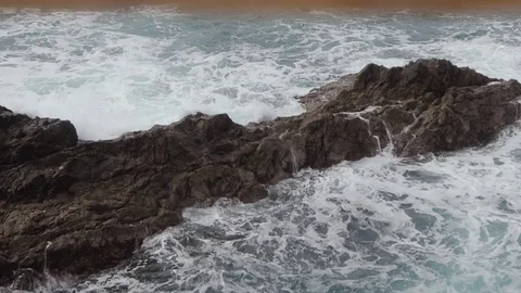 Big waves hitting the rocks. Sea waves crashing on the rocks during the storm Stock Footage 85285819