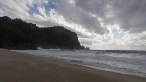 Big waves on Mediterranean sea on rainy day with beautiful clouds in the sky.  Stock Footage 72709458