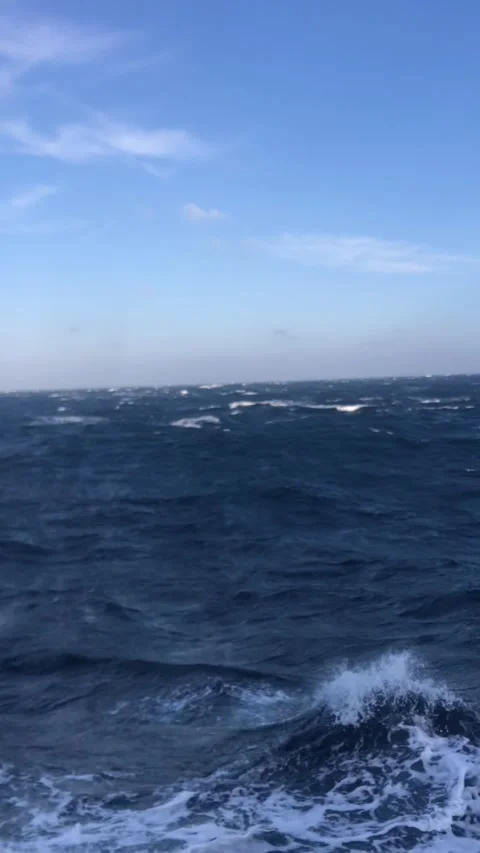 Big waves on the ocean from a sailing vessel Stock Footage 259843889