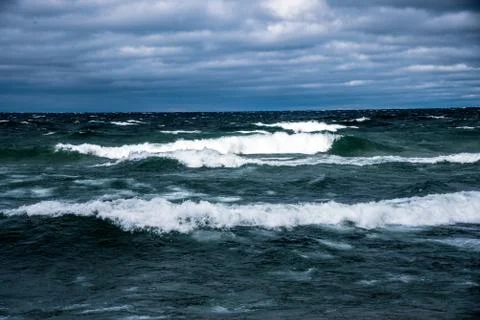 Big Waves at Pictured Rocks Beach at a storm and windy day on the fall Stock Photos