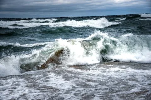 Big Waves at Pictured Rocks Beach at a storm and windy day on the fall Stock Photos