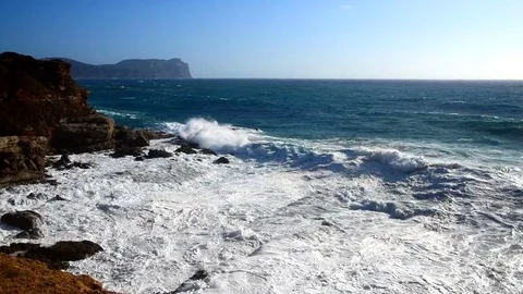Big waves in Porto Ferro shore. Sardinia, Italy Stock Footage