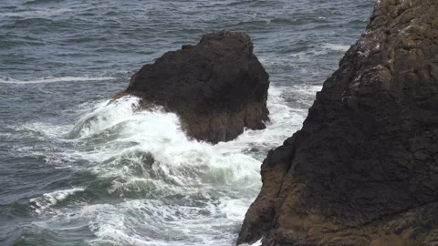 Big waves on rock Stock Footage 165303336