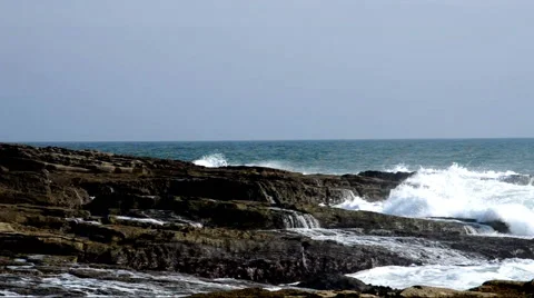 Big waves at rocky coast Stock Footage 42519849