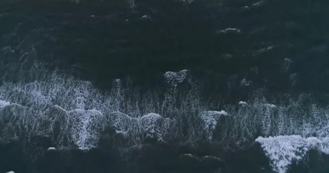 Big waves rolling from above. Top down 4k Drone view of a blue dark water Stock Footage 201059146