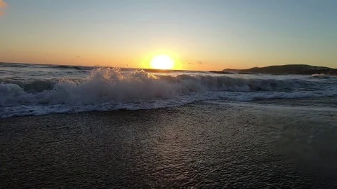 Big Waves On A Sea Beach At Sunset. Beautiful Waves Of Slow Motion Video On The Video stock 121473329
