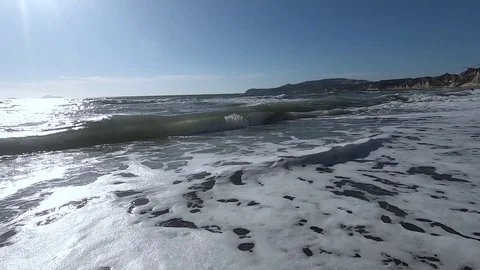 Big Waves On A Sea Beach At Sunset. Beautiful Waves Of Slow Motion Video On The Video stock 121528167