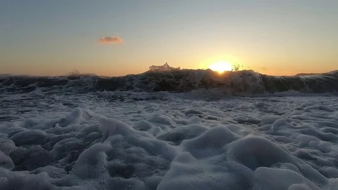 Big Waves On A Sea Beach At Sunset. Beautiful Waves Of Slow Motion Video On The Stock Footage 121528620
