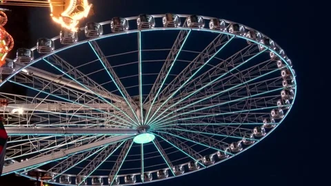 Big Wheel in Amusement park - 4K Stock Footage 296822979