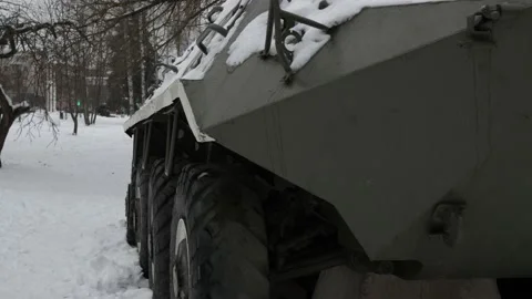 Big wheels in snow and mud. combat heavy military equipment Stock Footage 147206002
