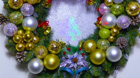 Big on a white background Christmas wreath decorated with colorful balls Stock Footage 166344480