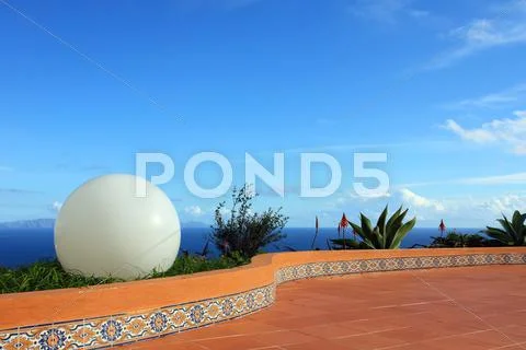 Big white ball and blue sky and sea scenery background Stock Photos