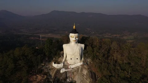 Big White Buddha under sunset in Thailand Stock Footage 125995868