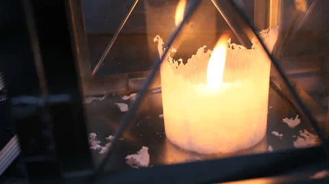 Big white candle in lantern Video stock 24835929