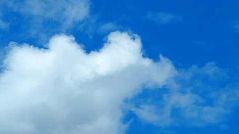 Big white cloud on the blue sky. 库存照片