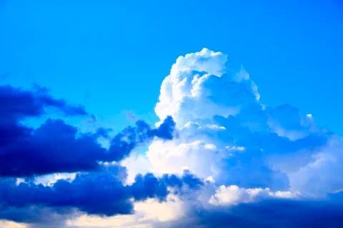 Big white cloud on blue sky. Heaven view Stock Photos