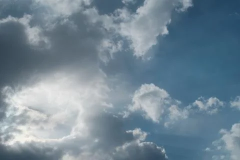 Big white clouds in the blue sky Stock Photos