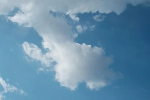 Big white clouds in the blue sky Stock Photos